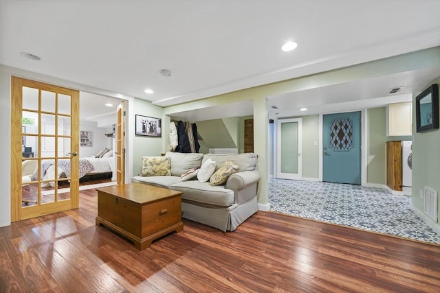 21 Hudson St, New Bedford, MA 02744 - living room featuring washer / clothes dryer, wood finished floors, baseboards, recessed lighting, and stairs