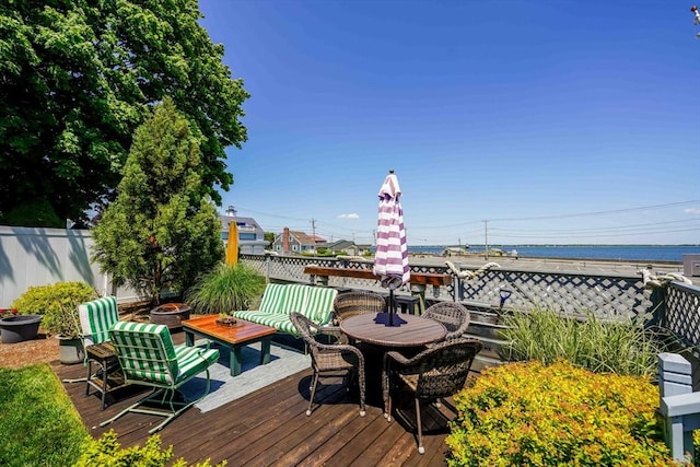 21 Hudson St, New Bedford, MA 02744 - wooden deck featuring an outdoor living space with a fire pit