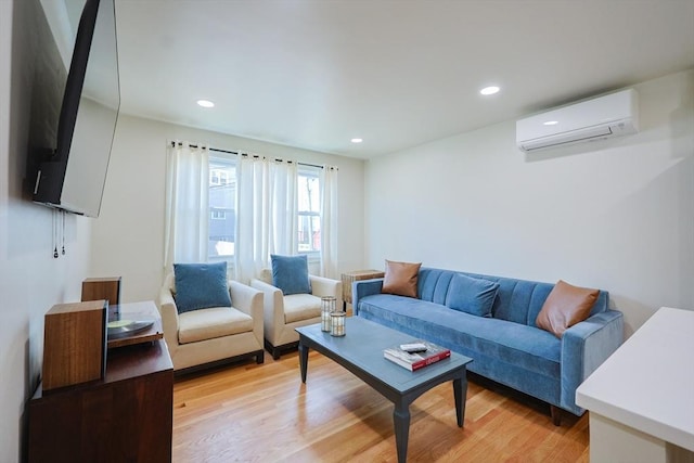 307 E Eagle St, Boston, MA 02128 - living area featuring a wall mounted AC, light wood-style floors, and recessed lighting