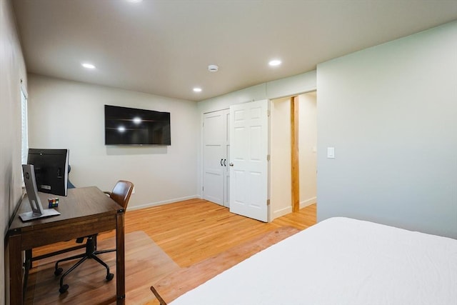 307 E Eagle St, Boston, MA 02128 - bedroom featuring light wood-style floors, recessed lighting, and an office area