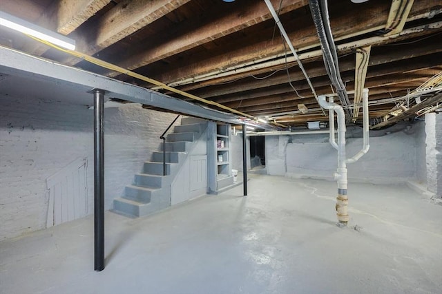307 E Eagle St, Boston, MA 02128 - unfinished below grade area featuring stairs