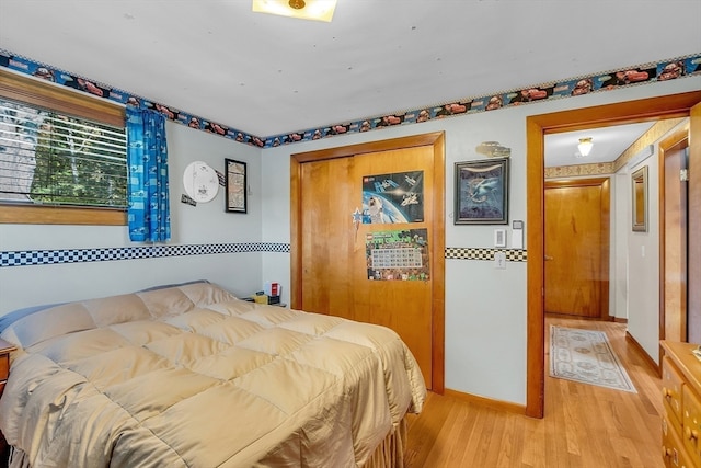 bedroom with wood-type flooring