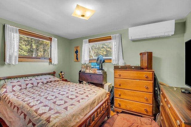 bedroom with a wall mounted air conditioner