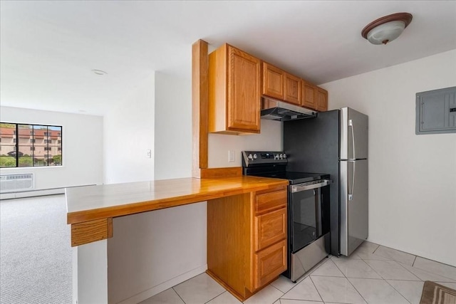kitchen with electric range, electric panel, under cabinet range hood, light countertops, and light tile patterned flooring