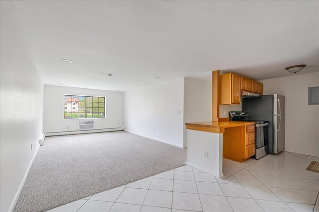 kitchen with light tile patterned flooring, under cabinet range hood, light carpet, stainless steel stove, and baseboards