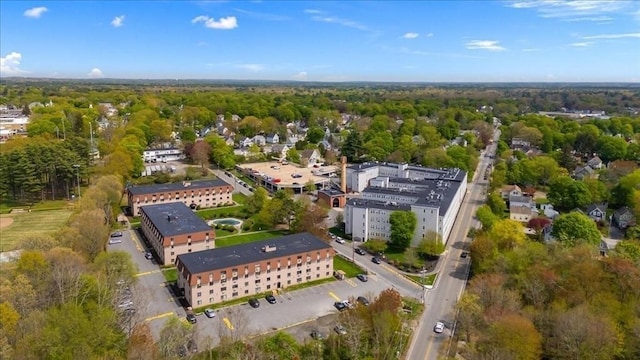 bird's eye view featuring a forest view