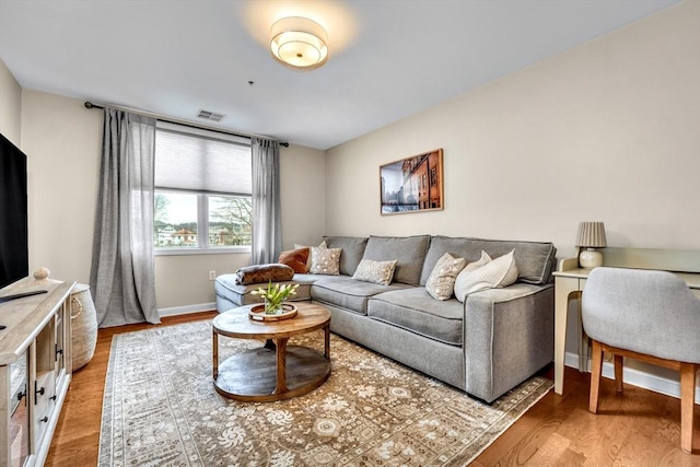 living room with hardwood / wood-style floors