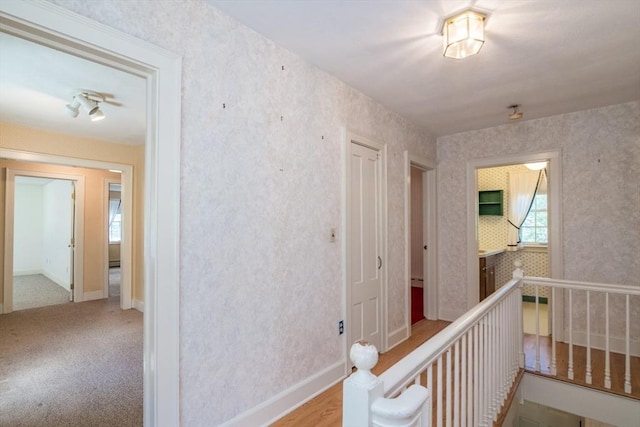 26 N Hillside Rd, Deerfield, MA 01373 - hallway featuring wallpapered walls and an upstairs landing