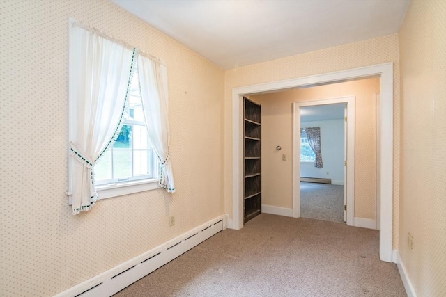 26 N Hillside Rd, Deerfield, MA 01373 - spare room featuring a baseboard radiator, healthy amount of natural light, carpet floors, and a baseboard heating unit