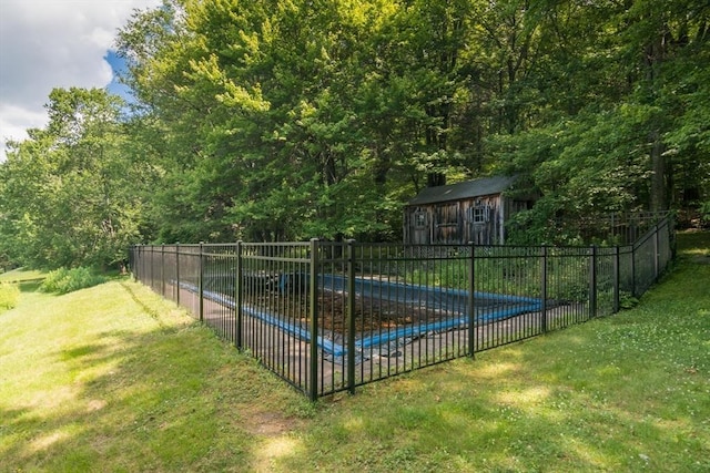 26 N Hillside Rd, Deerfield, MA 01373 - view of swimming pool with an outbuilding and a wooded view