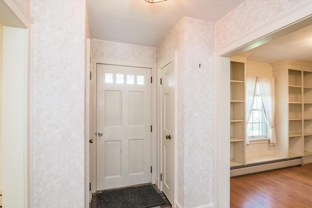 26 N Hillside Rd, Deerfield, MA 01373 - foyer entrance with baseboard heating and wood finished floors