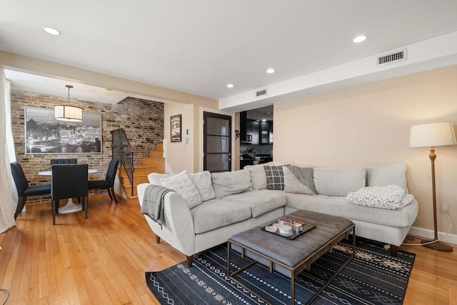 living room with hardwood / wood-style flooring