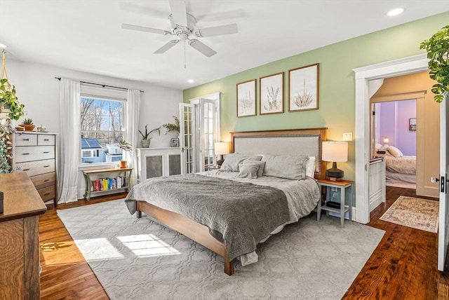 bedroom with recessed lighting, ceiling fan, and wood finished floors