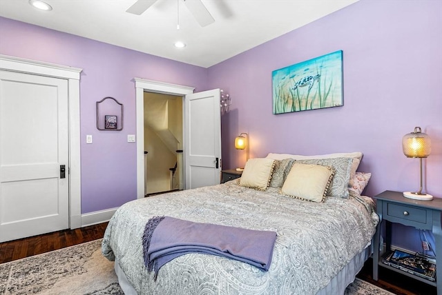 bedroom with a ceiling fan, recessed lighting, baseboards, and wood finished floors