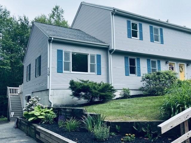 139 E County Rd Unit 139, Rutland, MA 01543 - view of side of property featuring a lawn
