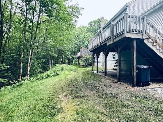 139 E County Rd Unit 139, Rutland, MA 01543 - view of green lawn featuring a wooden deck