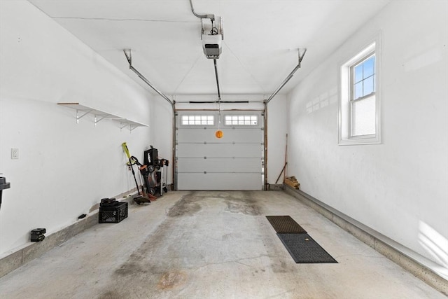 garage featuring a garage door opener