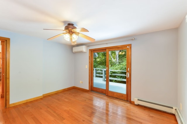 spare room with light wood-type flooring, ceiling fan, baseboard heating, and a wall mounted air conditioner