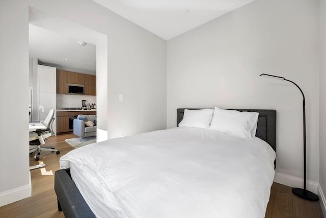 bedroom featuring light wood-type flooring