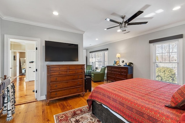 bedroom featuring recessed lighting, ornamental molding, ceiling fan, and wood finished floors