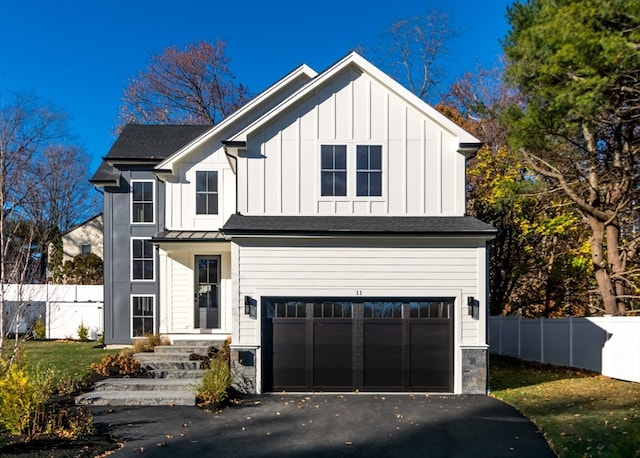 modern farmhouse with a garage