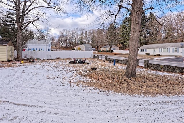 view of yard covered in snow