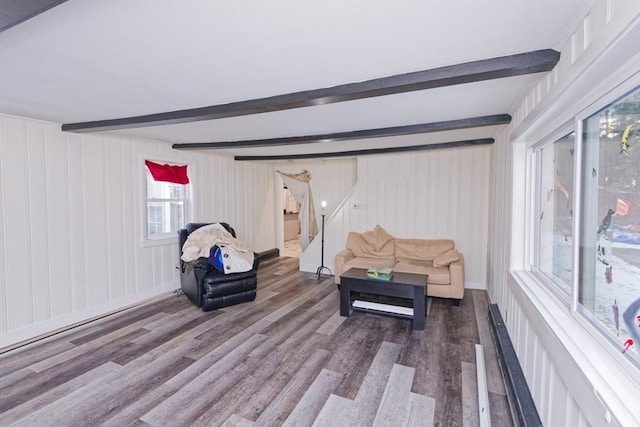 interior space featuring hardwood / wood-style flooring and beamed ceiling