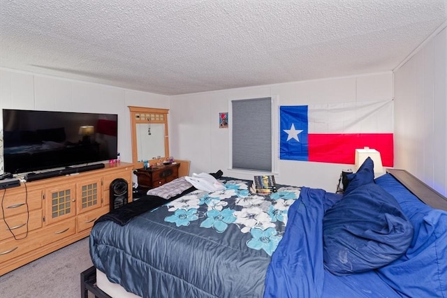 carpeted bedroom featuring a textured ceiling