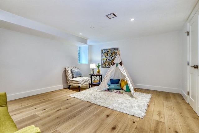 sitting room with light wood-type flooring