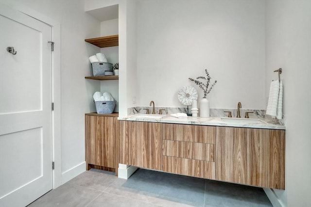 bar with light tile patterned flooring and sink