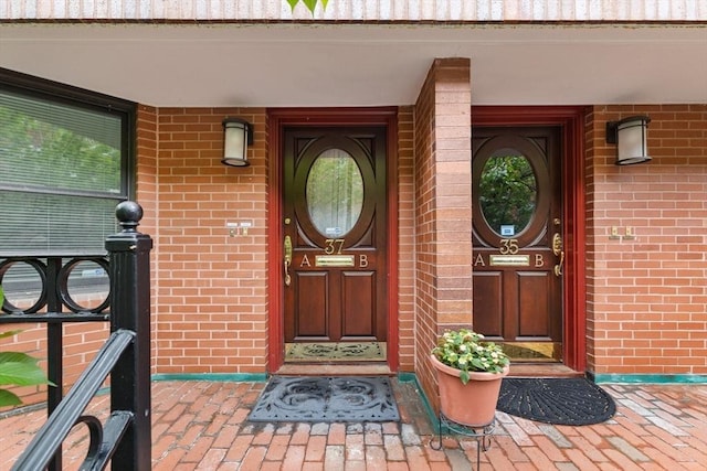 37 Symphony Rd Unit B, Boston, MA 02115 - doorway to property with brick siding and covered porch
