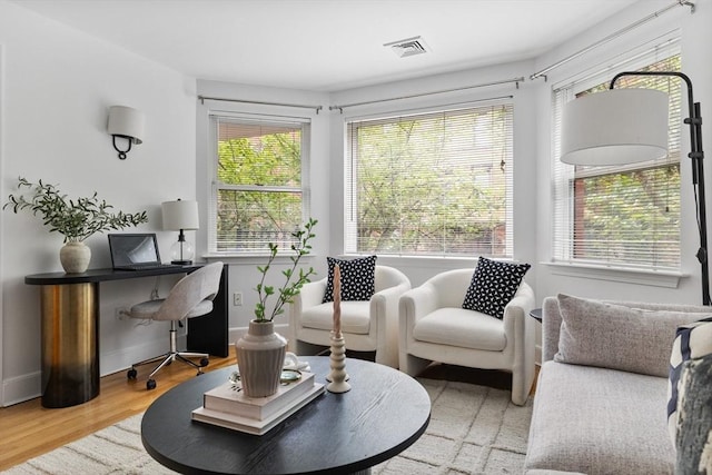 37 Symphony Rd Unit B, Boston, MA 02115 - living room featuring healthy amount of natural light, wood finished floors, and baseboards