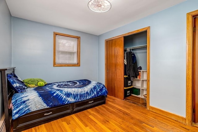 15 Winslow St, Gardner, MA 01440 - bedroom with wood finished floors, a closet, and baseboards