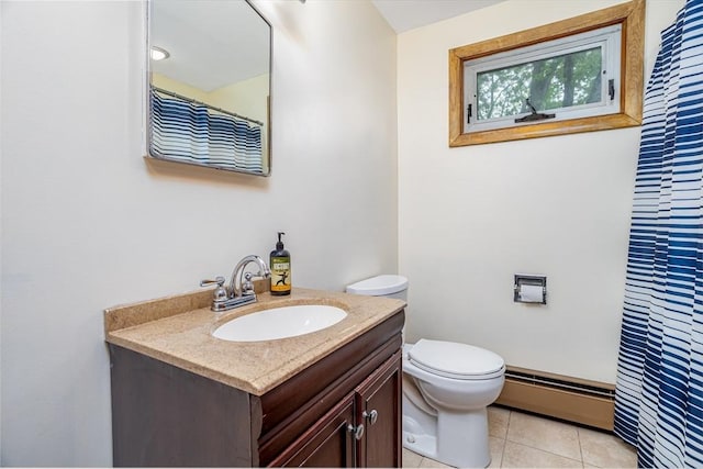 15 Winslow St, Gardner, MA 01440 - full bath with baseboard heating, tile patterned flooring, vanity, toilet, and a shower with shower curtain