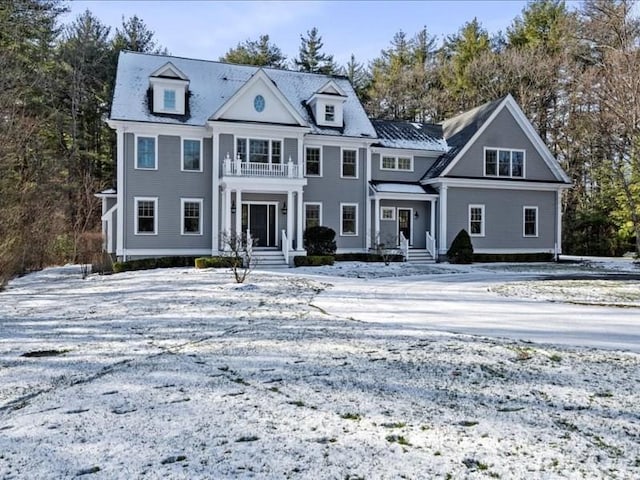 view of front of home with a balcony