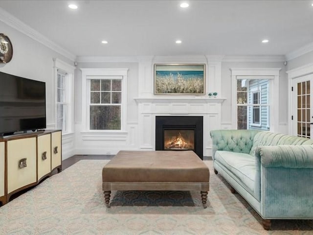 living room featuring crown molding