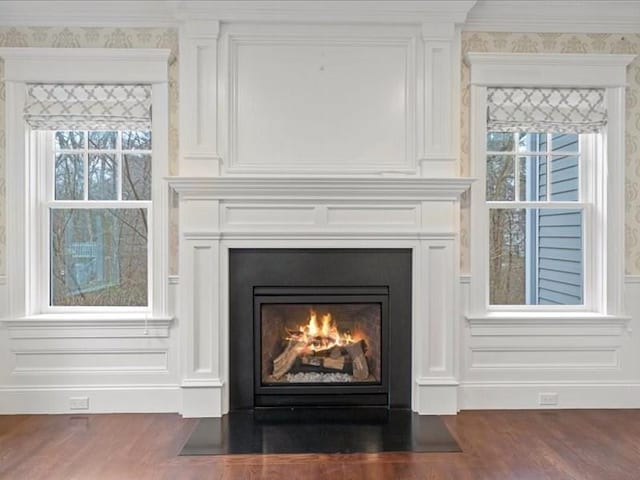 room details featuring wood-type flooring and crown molding