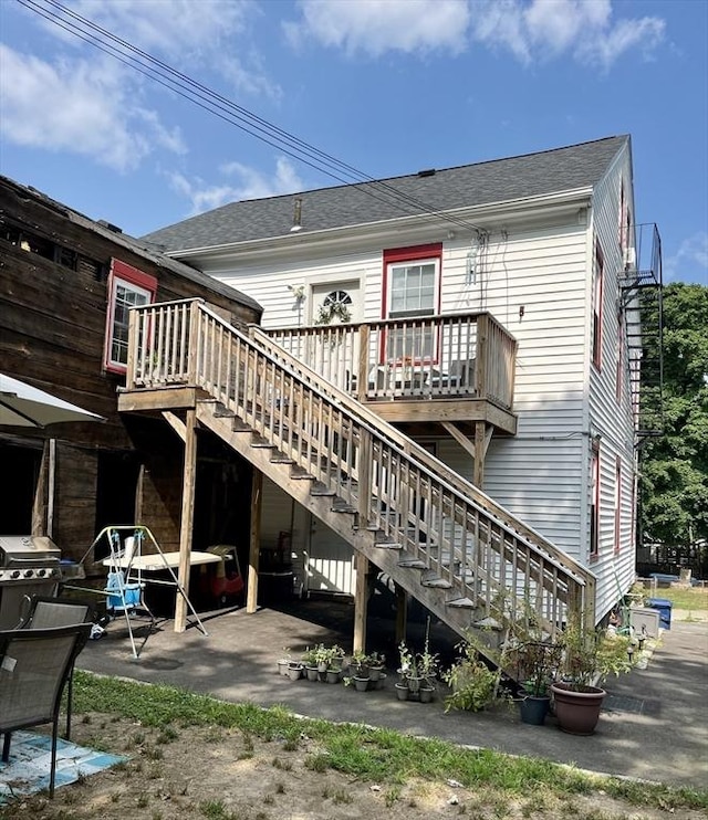 rear view of property with a patio area