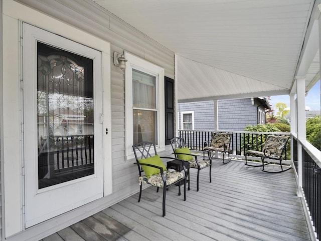 wooden deck featuring a porch