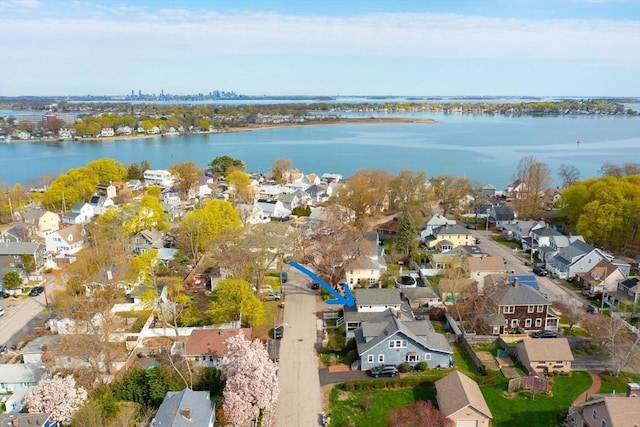 aerial view with a residential view and a water view