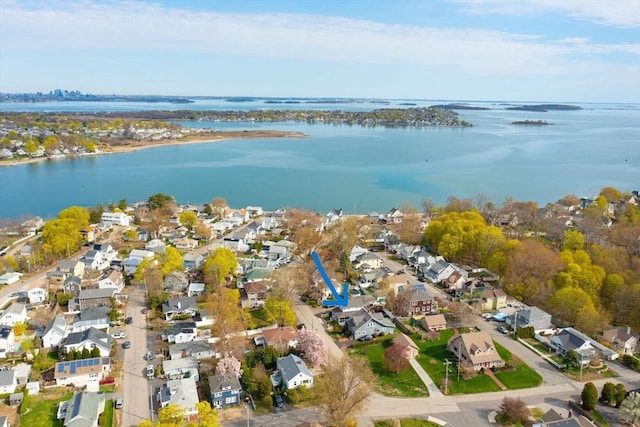 bird's eye view with a water view and a residential view