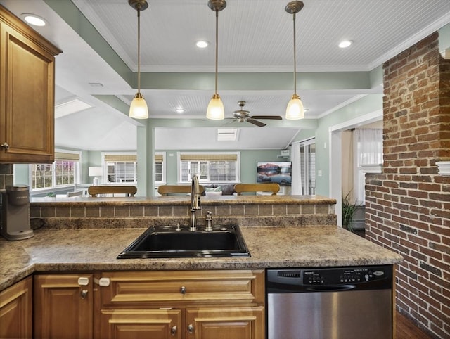 kitchen featuring brown cabinets, brick wall, a sink, and dishwasher