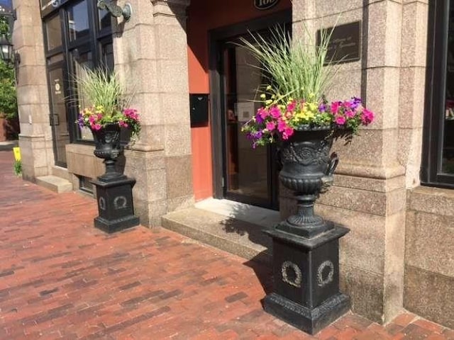 191 Main St Unit 2B, Gloucester, MA 01930 - property entrance featuring stone siding
