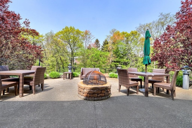 59 Walpole St Unit 202, Canton, MA 02021 - view of patio featuring outdoor dining area and an outdoor fire pit