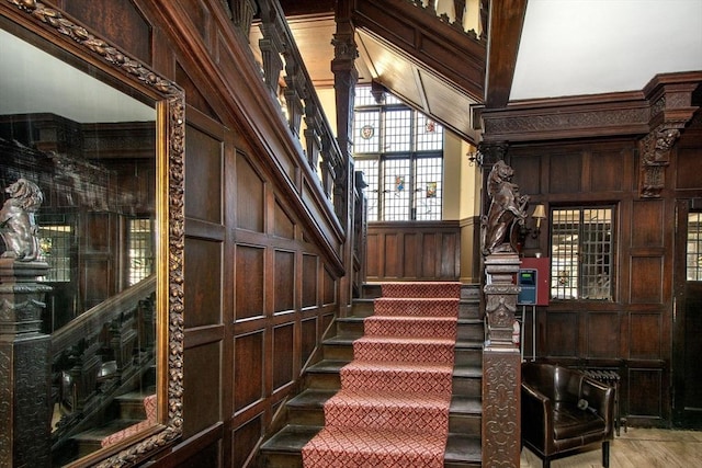 stairway with wooden walls