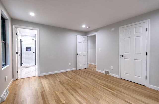 3 Gilbert Ln, Harwich, MA 02646 - unfurnished bedroom featuring light wood finished floors, recessed lighting, and connected bathroom