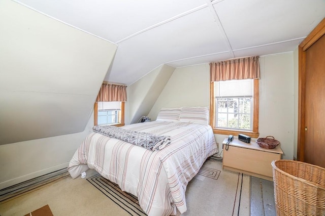 bedroom featuring multiple windows