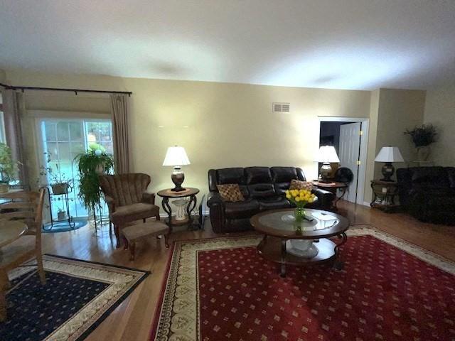 living room with hardwood / wood-style flooring