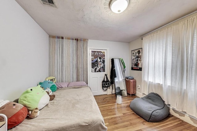 15 Ronan St Unit 3, Boston, MA 02125 - bedroom featuring wood finished floors and baseboards