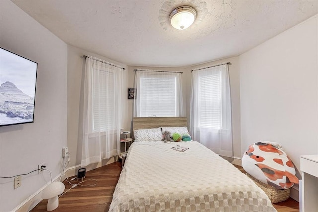 15 Ronan St Unit 3, Boston, MA 02125 - bedroom with wood finished floors and baseboards